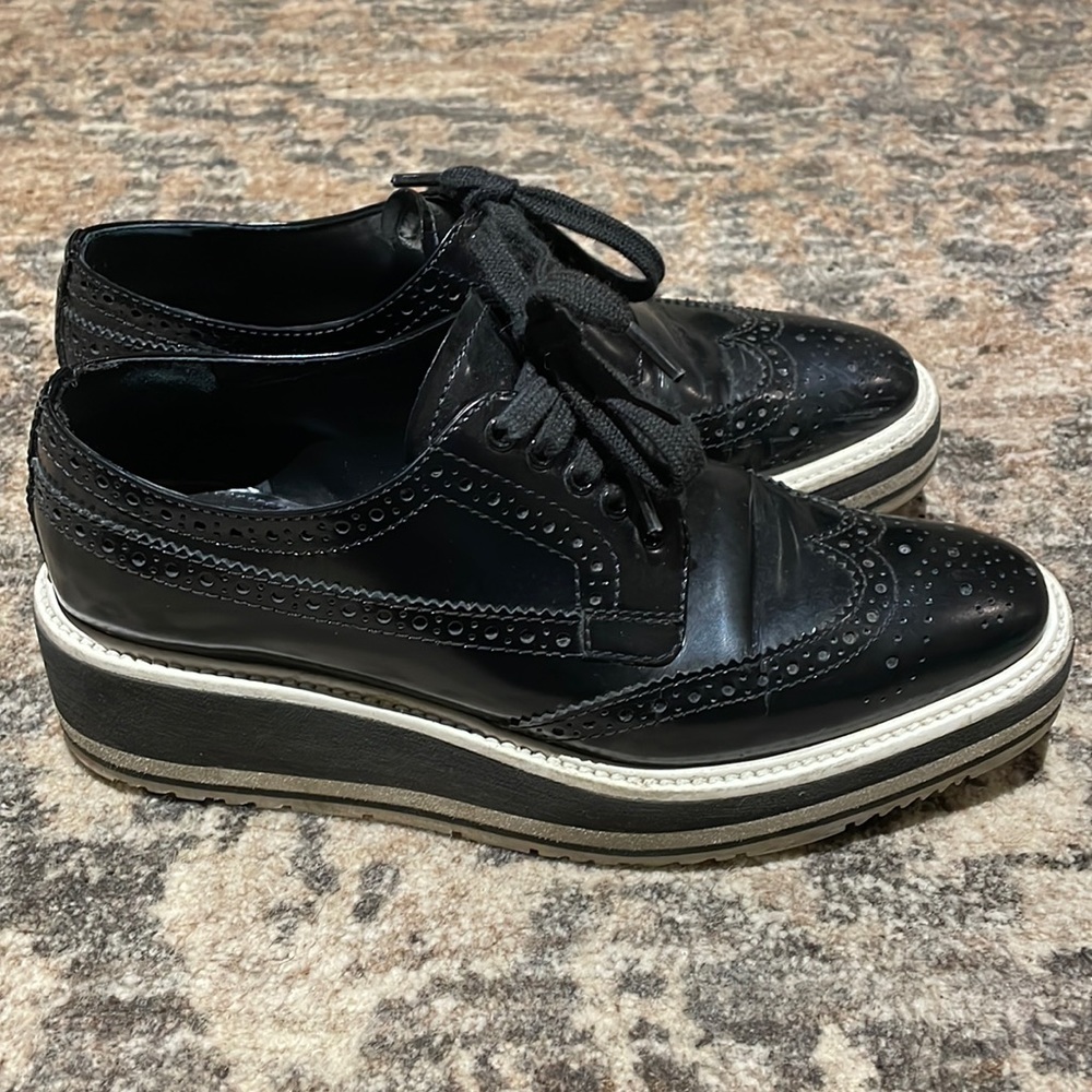 Prada lace up loafers